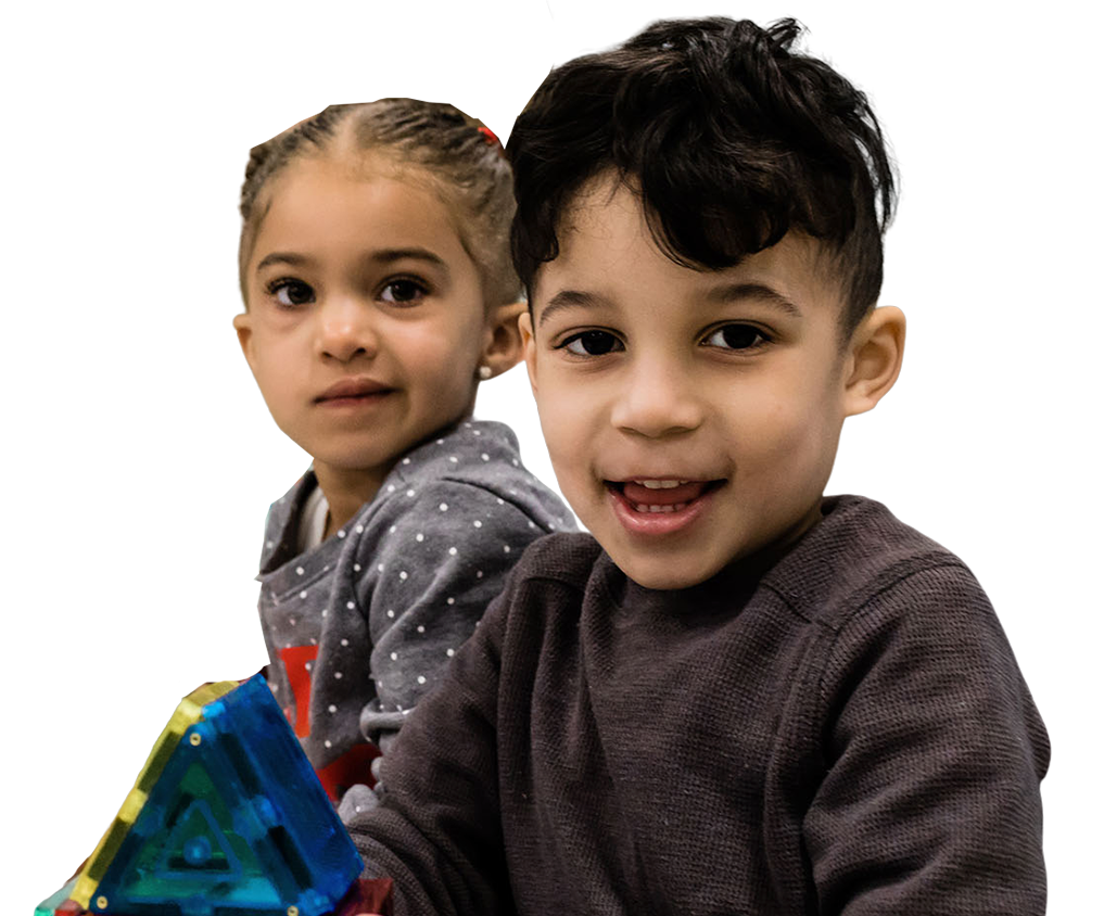 Preschool brother and sister wearing sweatshirt playing magnetic building blocks at a Childcare Serving Branford, Cheshire, Wallingford, CT